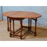 *OAK OVAL DROP LEAF TABLE