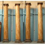 *SET OF FOUR LARGE PINE CLASSICAL STYLE COLUMNS WITH MARBLE EFFECT PAINTWORK, LATE 1900. EACH 3845MM