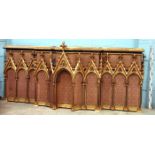 *POLYCHROMED GOTHIC ARCADED OAK REREDOS. ORIGINAL HIGHLY DECORATIVE PAINTWORK, 1860. 1270MM (50IN)