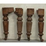 *SET OF THREE MAHOGANY LEGS WITH CASTORS. HEIGHT 710MM (28IN) X DIAMETER 130MM (5IN) [0]