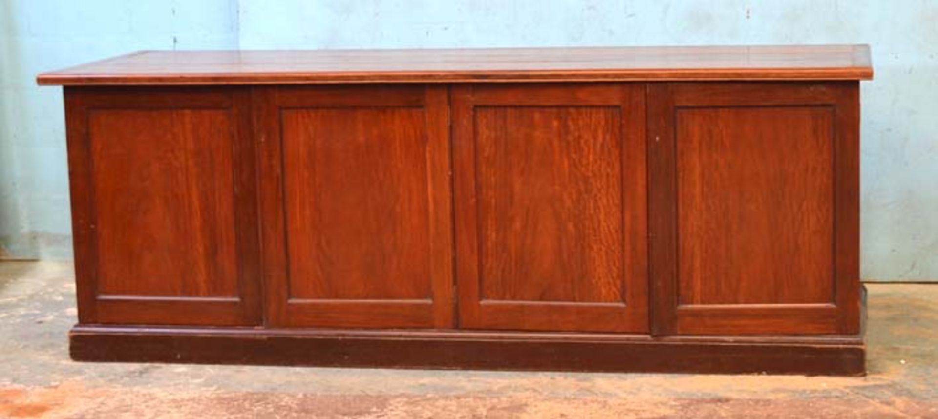 *ANTIQUE MAHOGANY COUNTER ADAPTED FROM A VICTORIA & ALBERT MUSEUM CABINET. 2780MM X 1015MM X 925MM