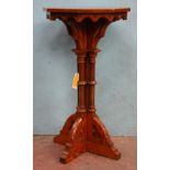 *PITCH PINE GOTHIC STAND WITH OCTAGONAL TOP AND TURNED COLUMNS. CIRCA 1890. 1035MM (40.75IN) HIGH