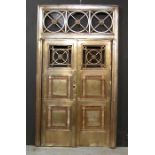 *BRONZE ENTRYWAY WITH MATCHING BRONZE DOORS, CIRCA 1900. SURROUND WIDTH 1635MM (64.25IN) X HEIGHT