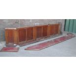 *4.7M RECLAIMED 1940S OAK PUB CAFE BAR FRONT PANELLING. A PLAIN AND HANDSOME MID CENTURY BAR TOP AND
