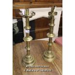 *PAIR OF ENGLISH BRASS CANDLESTICKS, HEIGHT 810MM (32IN), DIAMETER OF BASE 220MM (8.5IN)