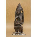 A Carved African Tribal Figure Of A Woman With A Child, 32cm.