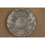 A Chinese White Metal Zodiac Dish With Coin Centre, 9.5cm Diameter