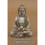 A Small Chinese Carved Hardstone Pendant Buddha