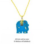 Carved Turquoise Pendant Of An Elephant, With Ruby Eye, On A Gold Coloured Chain