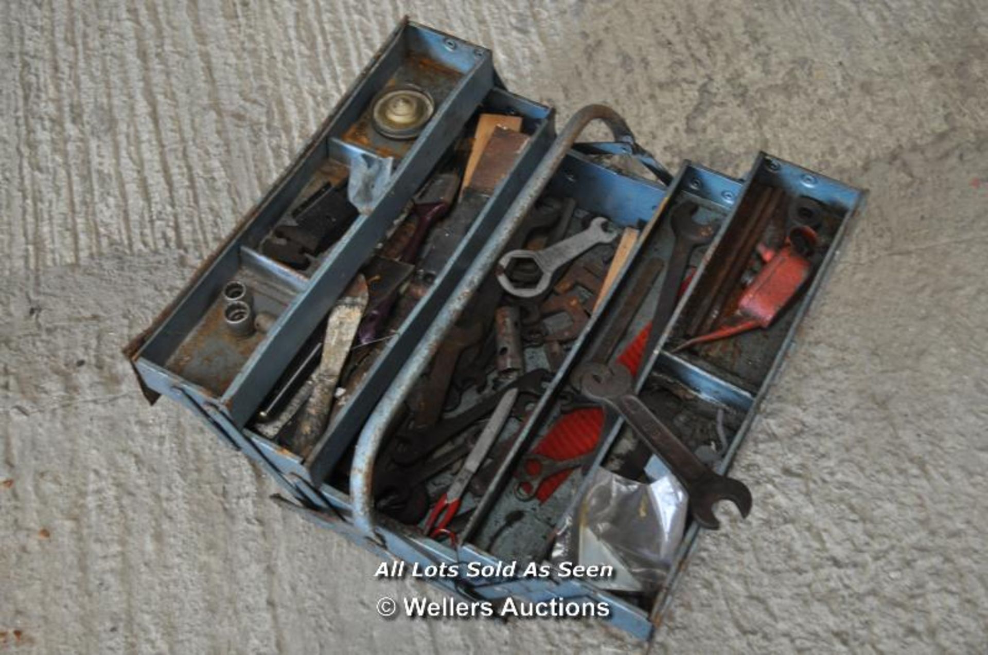 METAL FOLD OUT TOOLBOX FULL OF OLD TOOLS INCLUDING MAINLY SPANNERS, NAMES OF B.S.A ETC