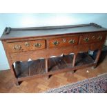 An 18th century oak three drawer dresser base