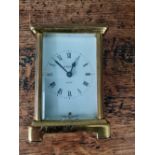 A Small Victorian style brass carriage clock