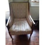 An Edwardian mahogany bedroom armchair