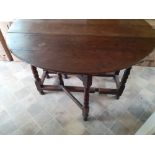An 18th century and later Oak gateleg table.