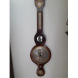 A 19th century mahogany cased banjo barometer 37" High