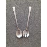A Pair of Silver Salad servers with slight hammered bowls. G of H London 1975