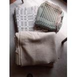 Two Welsh Blankets one with attached curtain tape and three cream blankets