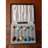 A boxed set of Silver gilt coffee bean spoons with enamelled bowls Birmingham 1950s