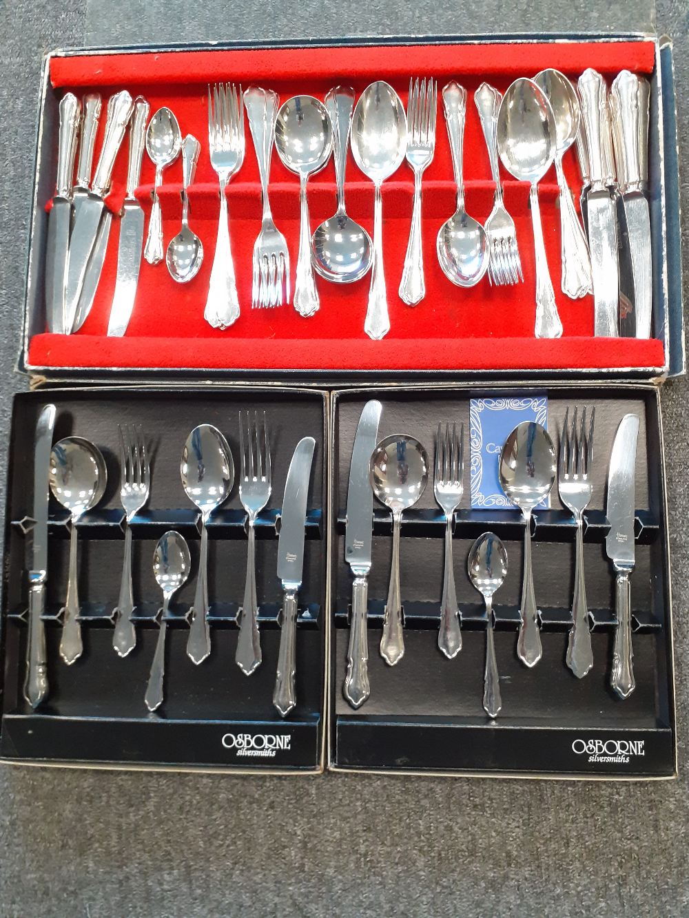 A Modern set of Osbourn silver plated cutlery for eight