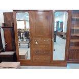 An Edwardian Mahogany double wardrobe