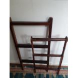 Two Edwardian mahogany clothes rails