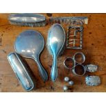 A collection of Silver A silver backed hair brush two small brushes, mirror, silver topped comb etc