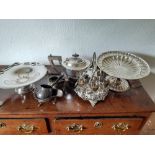 A Silver plated teapot, plated egg stand two sauce boats and two cake stands brandy warmer.