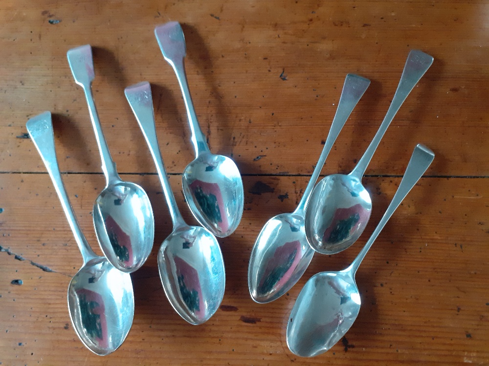 Two odd Georgian silver serving spoons good condition London hallmark.