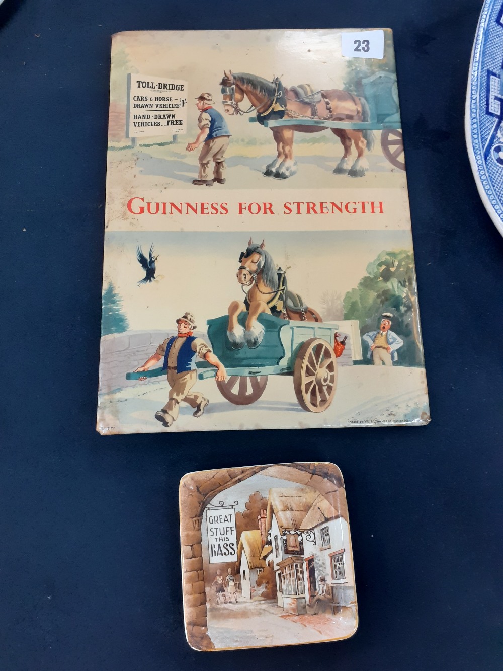 A 1950s Guinness for strength advertising plaque 8.5" x12"together with a bass advertising ashtray.