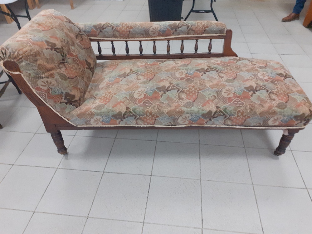 A late Victorian chaise upholstered