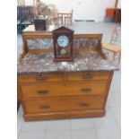 A victorian satinwood washstand with a marble top and back 42"x20"x31""