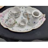A Herand Hungary porcelain cabaret coffee set hand painted with flowers.