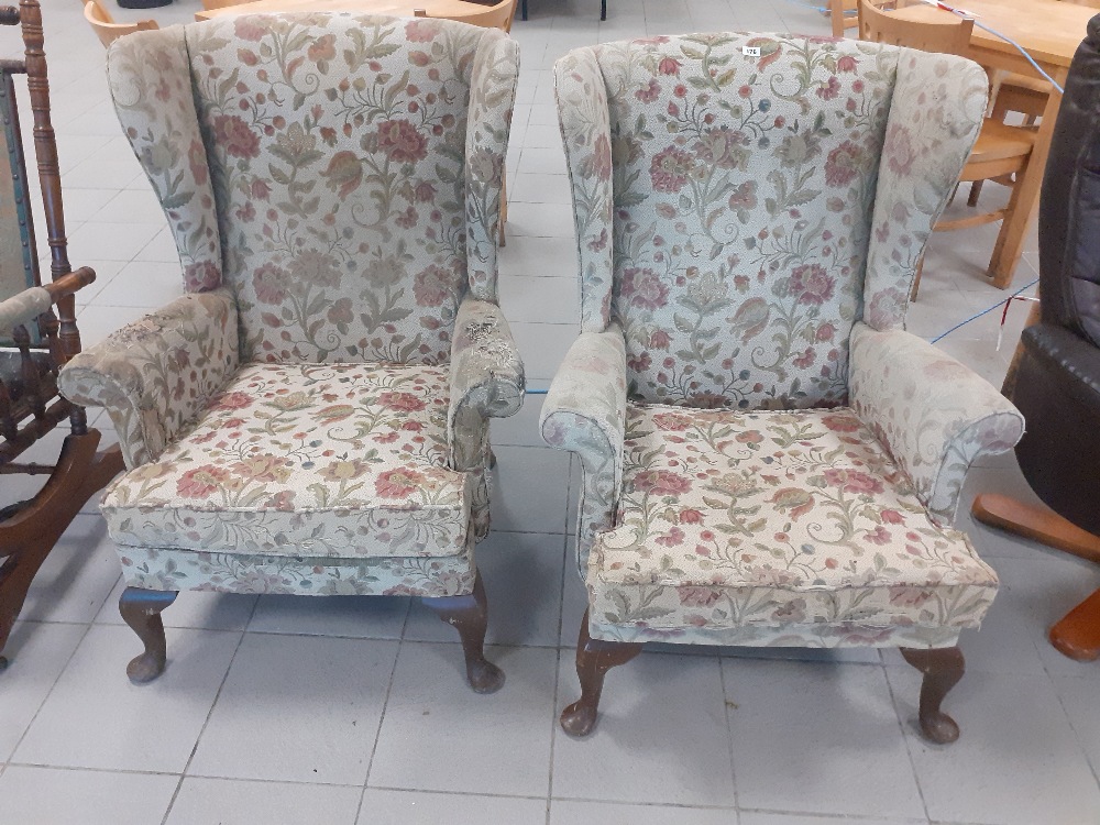 Two upholstered parker knoll wingback chairs