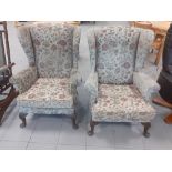 Two upholstered parker knoll wingback chairs