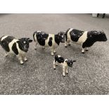 A Beswick model of bull two cows and a calf etc 6 items,