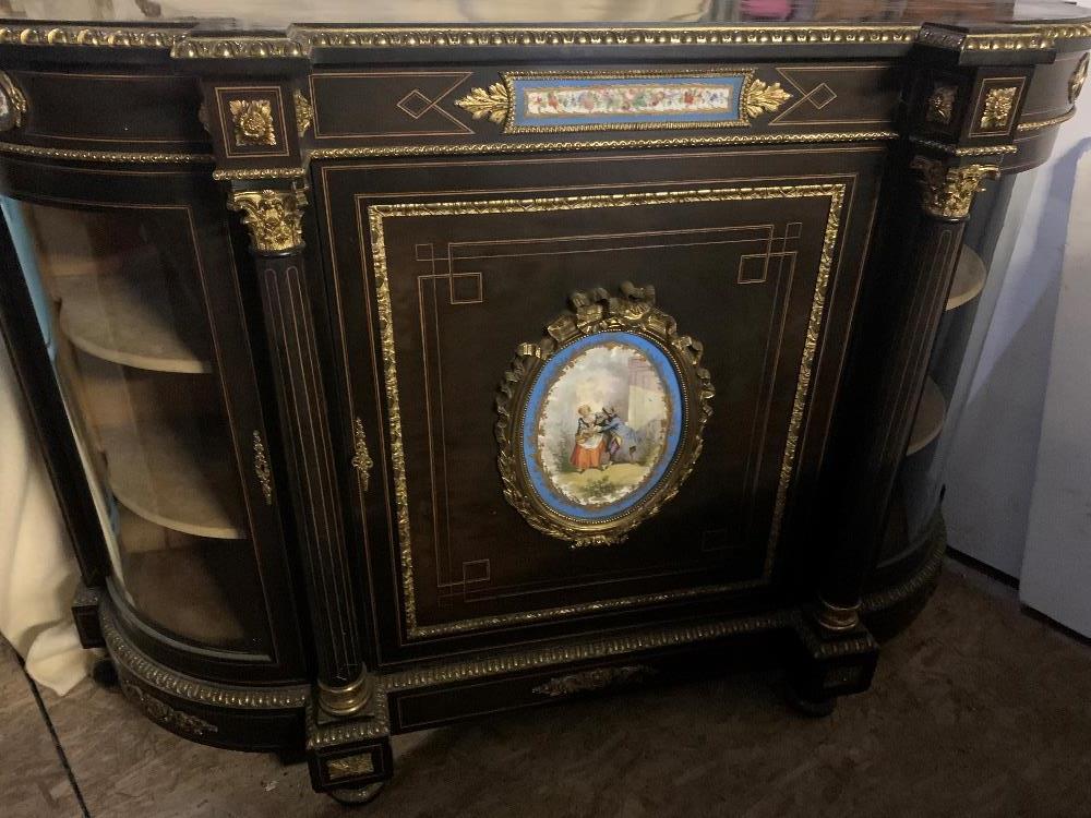 A Victorian ebonised Credenza inlaid with sevres style porcelain plaques circa 1870 68” long 45” hig