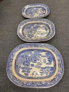 A collection of blue and white meat plates