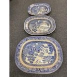 A collection of blue and white meat plates