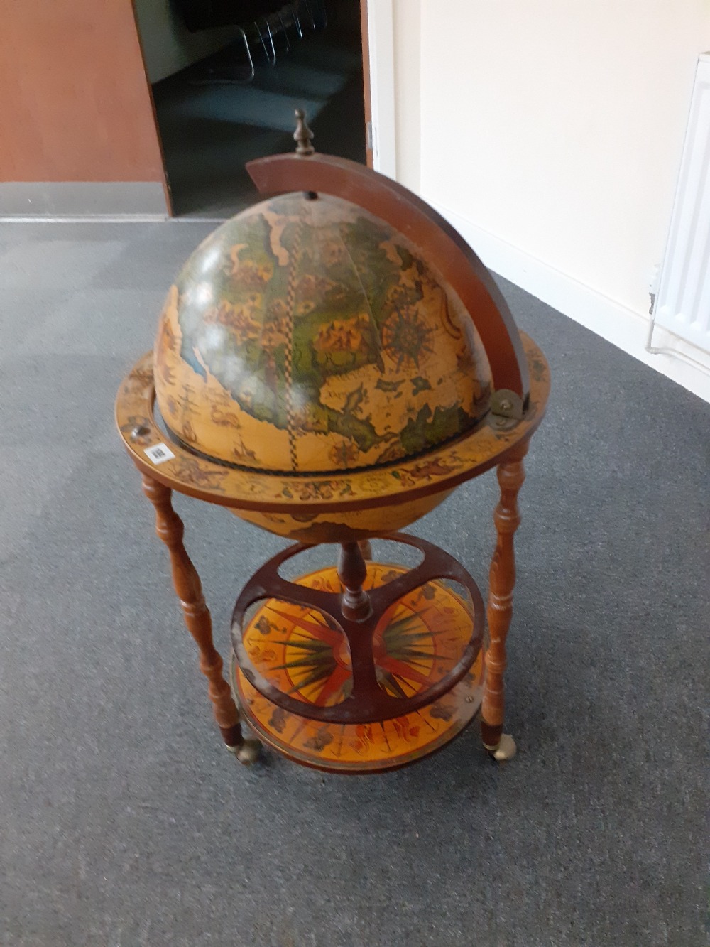 A repro globe Drinks stand