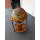 A repro globe Drinks stand