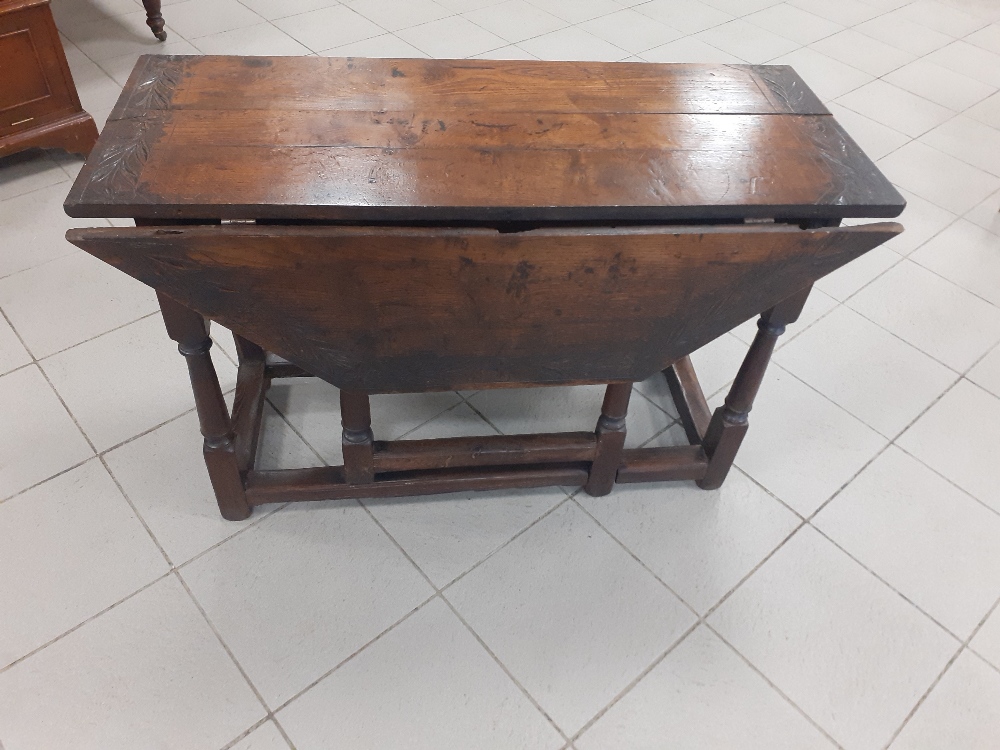 An Oak dining table of different periods 44"x26"