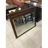 A late Victorian carved mahogany over mantle mirror. 106cm x 90cm.