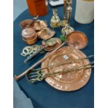 A pair of brass candlesticks and a collection of brass and copperware aprox 17 items