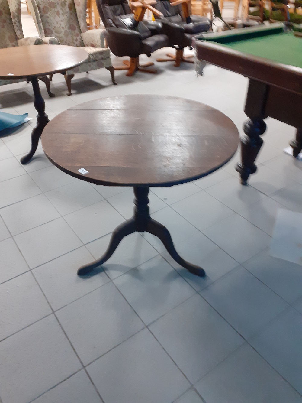 An early 19th century oak tripod table 32" dia