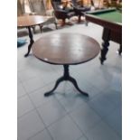 An early 19th century oak tripod table 32" dia