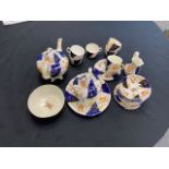 A 19th century Gaudy Welsh tulip pattern tea set approx 28 pieces.