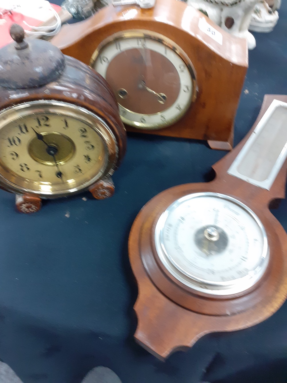 A Victorian wooden cased alarm clock 1950/60 mantle clock and a modern barometer.