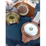 A Victorian wooden cased alarm clock 1950/60 mantle clock and a modern barometer.