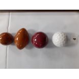 Four W L S ltd Torquay pottery sport balls for Scotch Whiskey three with contents.