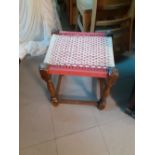 A small turned wooden stool